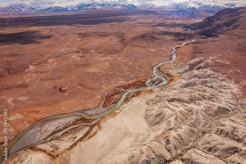 Landscape winding river and mountains Altai Republic Russia, white sand in Moon valley, aerial top view sunny day photo