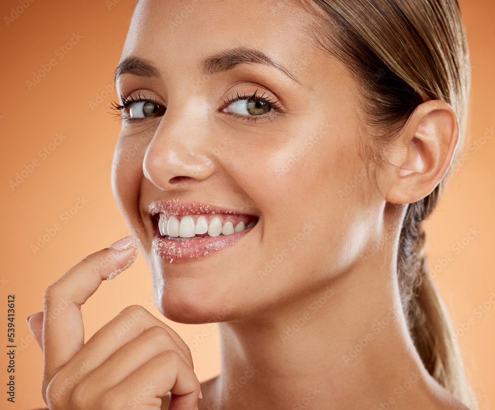 Woman beauty, sugar scrub lips and facial skincare cosmetics for mouth, makeup and face aesthetic on studio background. Portrait of happy model exfoliate, cleaning and natural peeling lipstick mask Woman beauty, sugar scrub lips and facial skincare cosmetics for mouth, makeup and face aesthetic on studio background. Portrait of happy model exfoliate, cleaning and natural peeling lipstick mask
