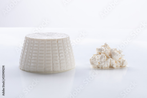fresh cottage cheese on white background