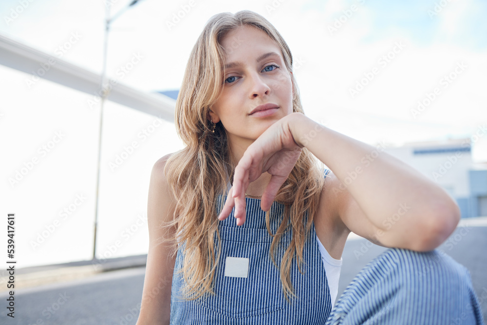 Obraz premium Fashion, beauty and city with a model woman outdoor on the road or street for contemporary and edgy style. Portrait, trendy and clothes with an attractive or stylish young female in an urban town