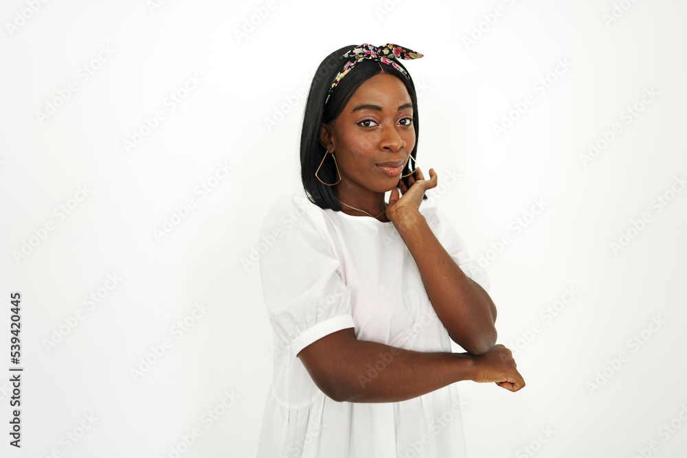 Beautiful young african woman posing over white background Beautiful young african woman posing over white background
