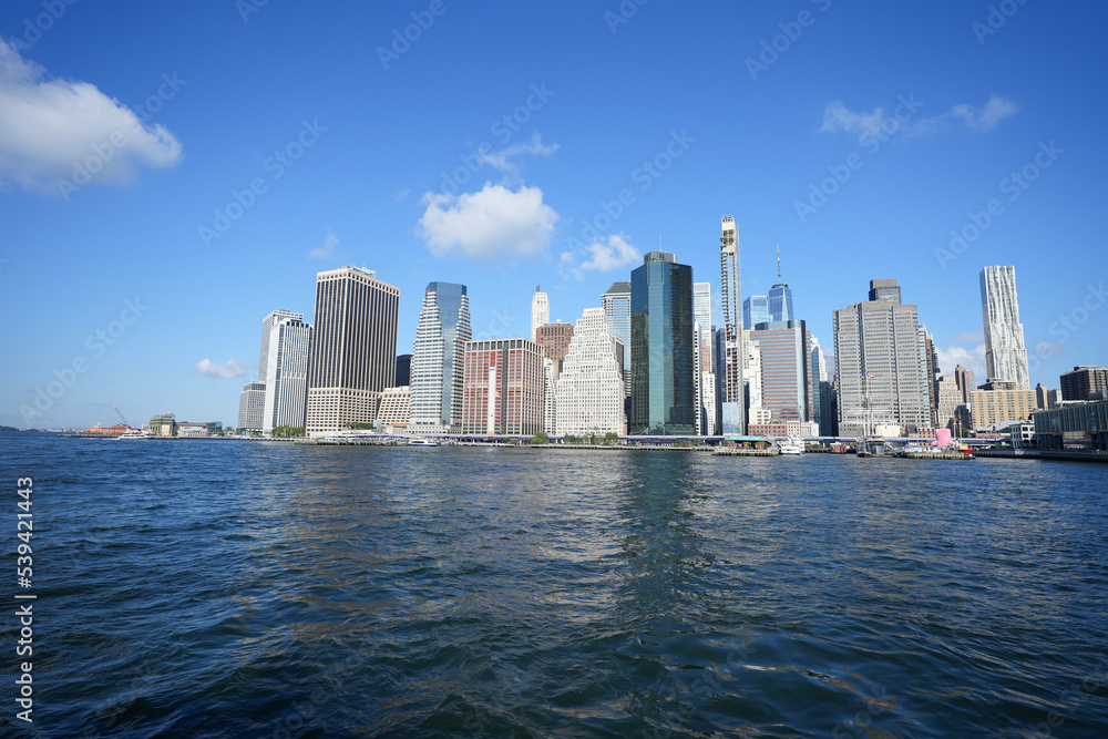 New York City Midtown Manhattan panorama over the Hudson River. photo during the day. New York City Midtown Manhattan panorama over the Hudson River. photo during the day.