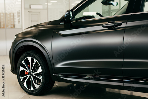 side part of black matte luxury car
