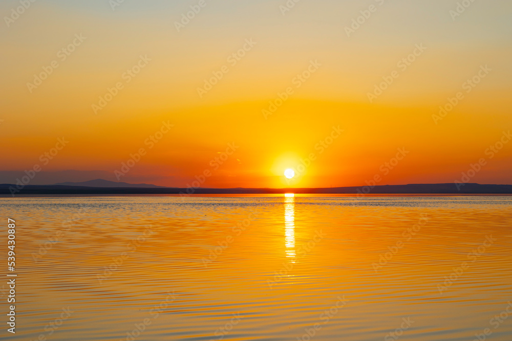 Sunset view. Sunset over the lake. Tranquilty background photo