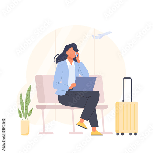 Woman at the airport and working on a laptop and talking