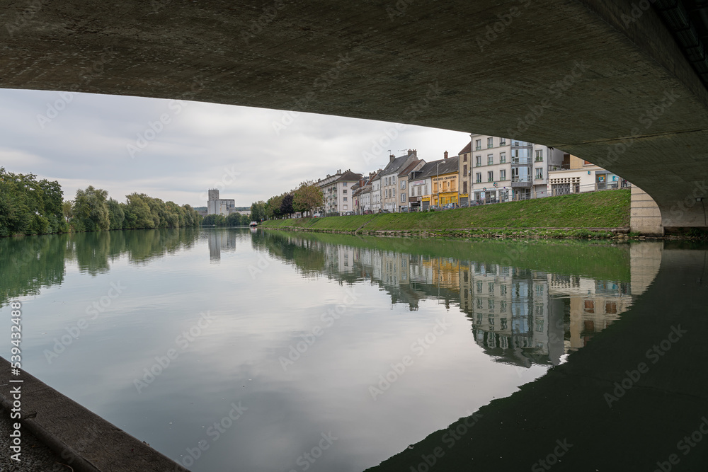 The river Marne and the south bank buildings from under Pont Aspirant de Rouge - Rue Carnot Bridge., Chateau Thierry, France