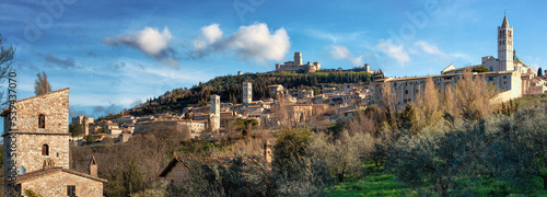 Assisi, Perugia. Veduta della cittadina con chiese e campanili verso verso la Rocca Maggiore photo
