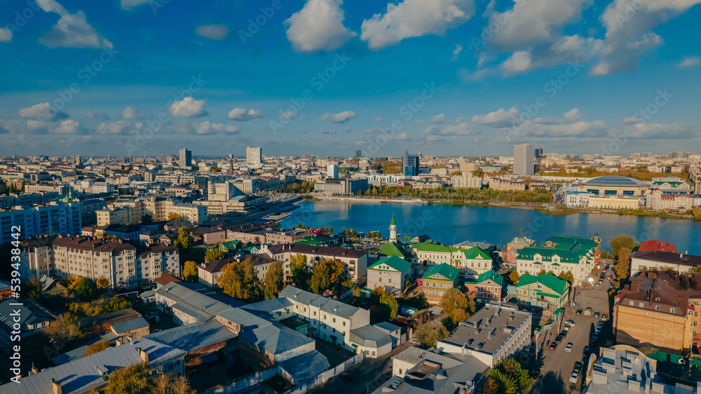 Old Tatar district. Traditional Tatar neighborhood on the shore of Lake Kaban in Kazan. A view of the Al-Marjani Mosque. Top view. Autumn city 
