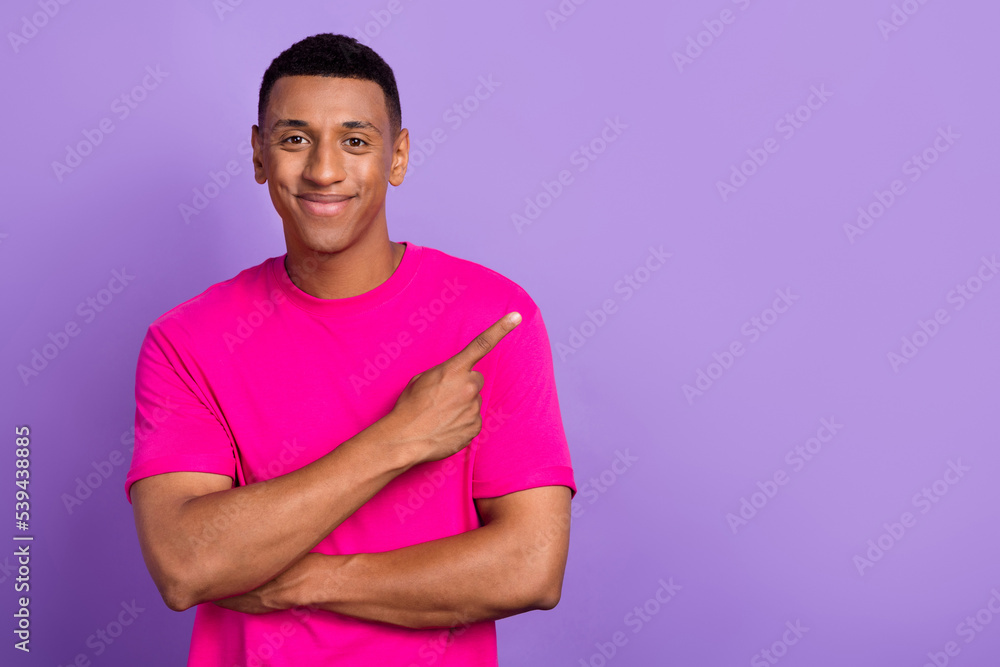 Fototapeta premium Closeup portrait photo of young successful macho businessman wear neon t-shirt finger directing empty space deal isolated on pastel violet color background