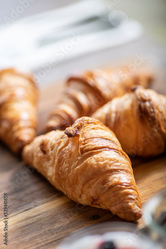 croissants on a wooden board © Andrew