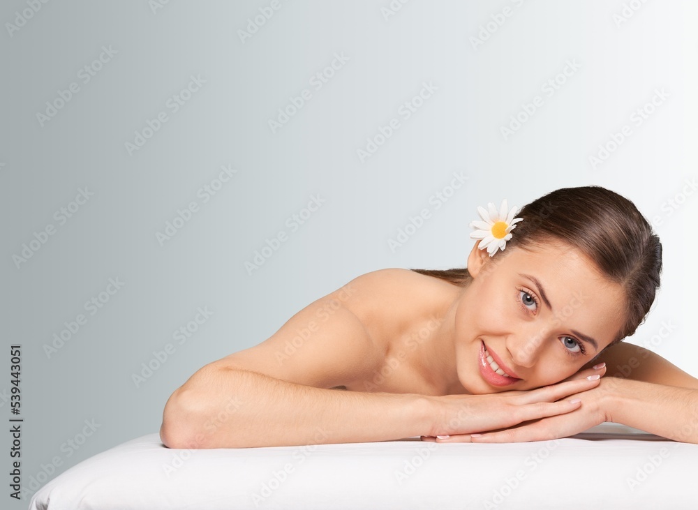 Happy young Woman with clean Skin after Treatment