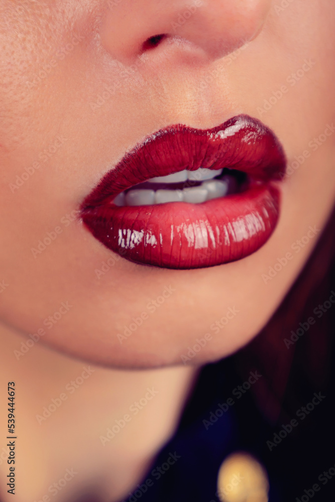 woman with glossy red lipstick close up woman with glossy red lipstick close up