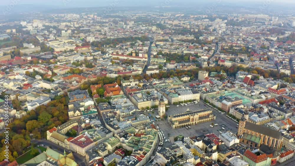 Aerial view of St Mary's Basilica (Mariacki Church) in the Old Town of Krakow (Cracow), Poland, central Europe. Aerial. St. Mary's Basilica church at the Market square in Krakow. Poland. Old city. Aerial view of St Mary's Basilica (Mariacki Church) in the Old Town of Krakow (Cracow), Poland, central Europe. Aerial. St. Mary's Basilica church at the Market square in Krakow. Poland. Old city.