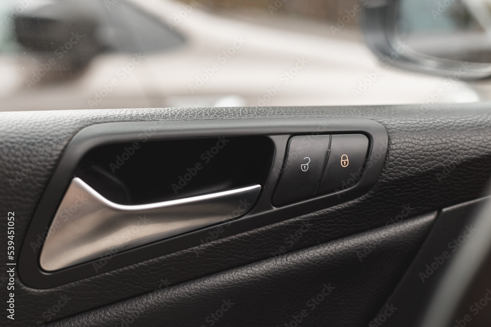 A car lock button and status light A car lock button and status light