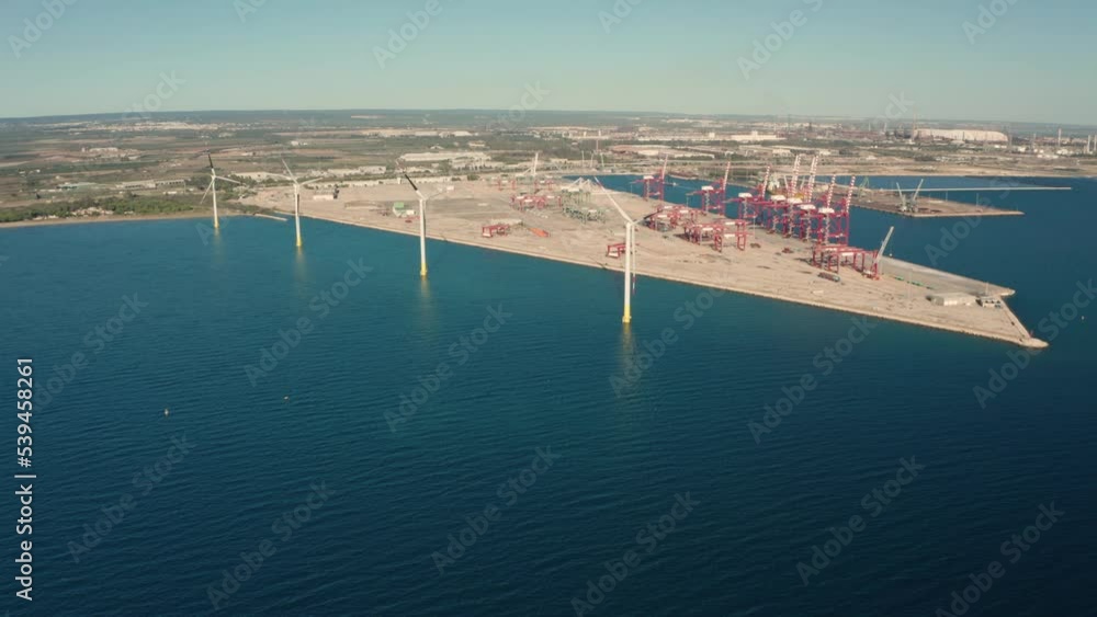 Wind turbines at sea in the port of Taranto 2 Wind turbines at sea in the port of Taranto 2