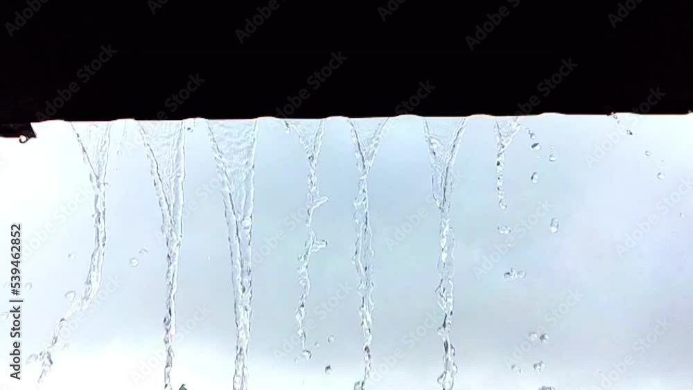 Roof in the raining time. Closeup Shot Of Heavy Rain Roof in the raining time. Closeup Shot Of Heavy Rain