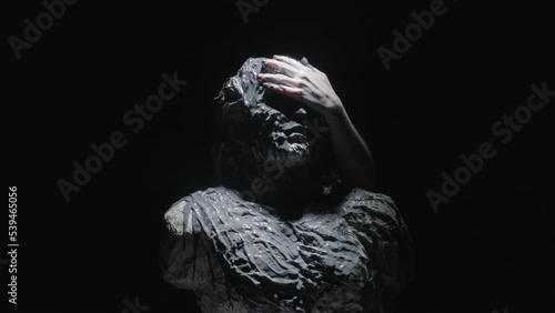 Wallpaper Mural A white statue of a man. Paint is pouring on the white statue. Torontodigital.ca