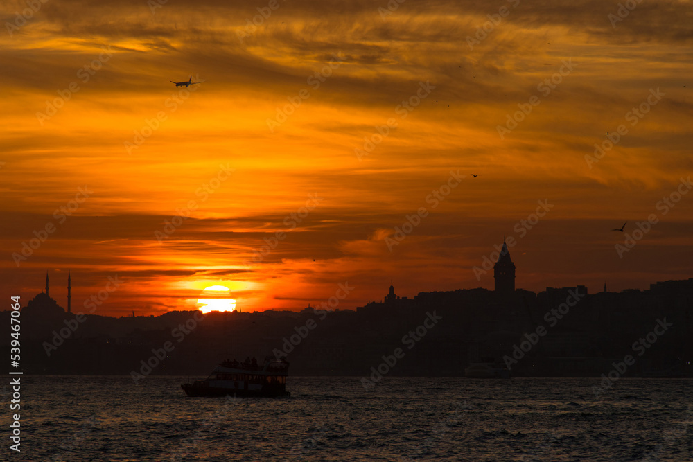 Silhouette of Istanbul at sunset. Bosphorus panoramic view from Uskudar district.
