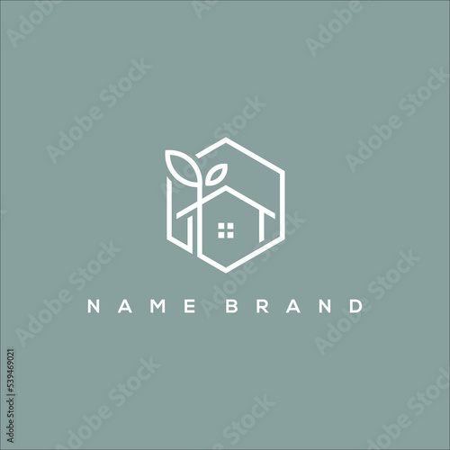 A line art icon logo of a house / home with a leaf circle