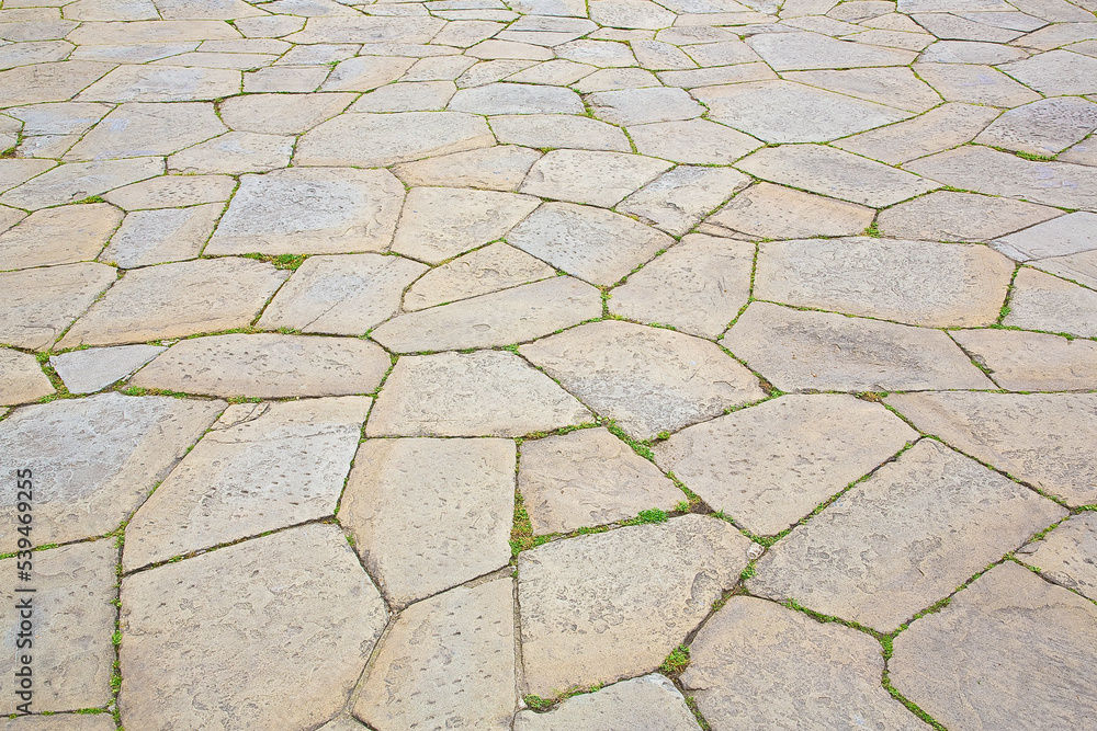 Poster Typical traditional urban italian stone paving made with Opus ...