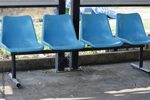 row of blue chairs