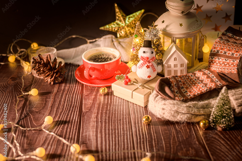 Christmas and Winter decorations on wooden table with decorative lights , Christmas background