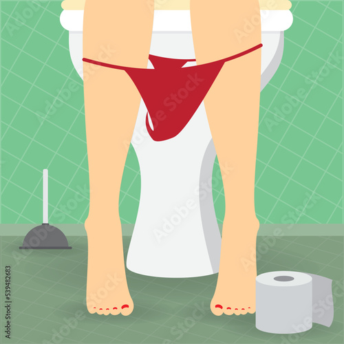Legs of a woman near a toilet bowl