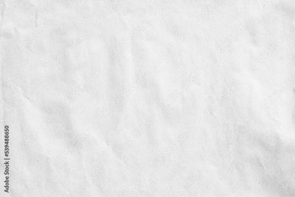 Fototapeta premium Crumpled white paper wallpaper texture