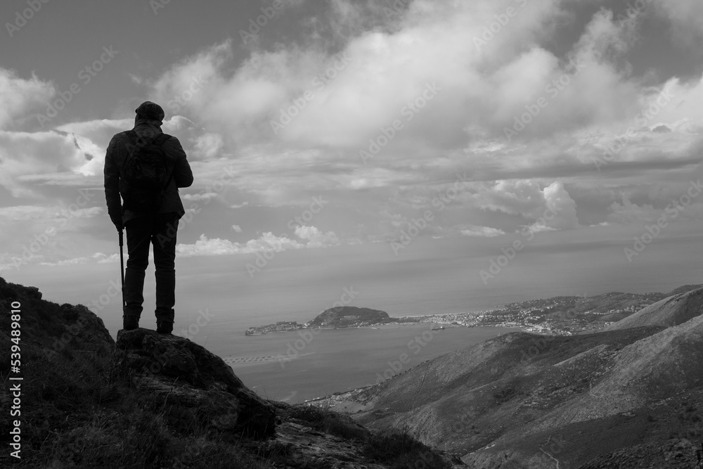 Hiker on the summit of aurunci mountains and gaeta gulf