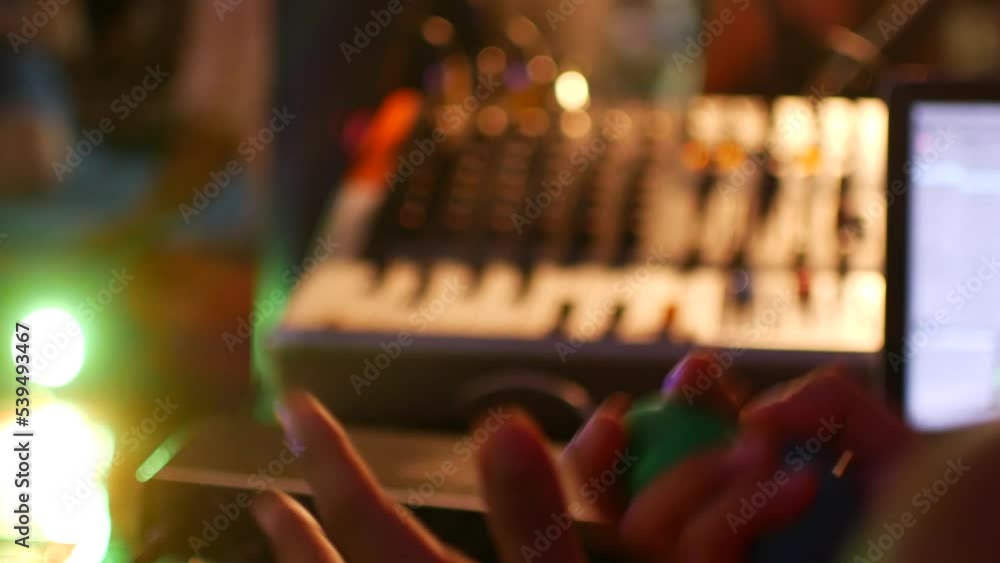 The musician plays the shakers, hands in the frame The musician plays the shakers, hands in the frame