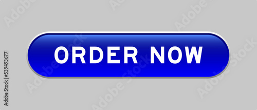Blue color capsule shape button with word order now on gray background