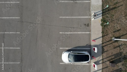 Footage of electric car on EV charging station