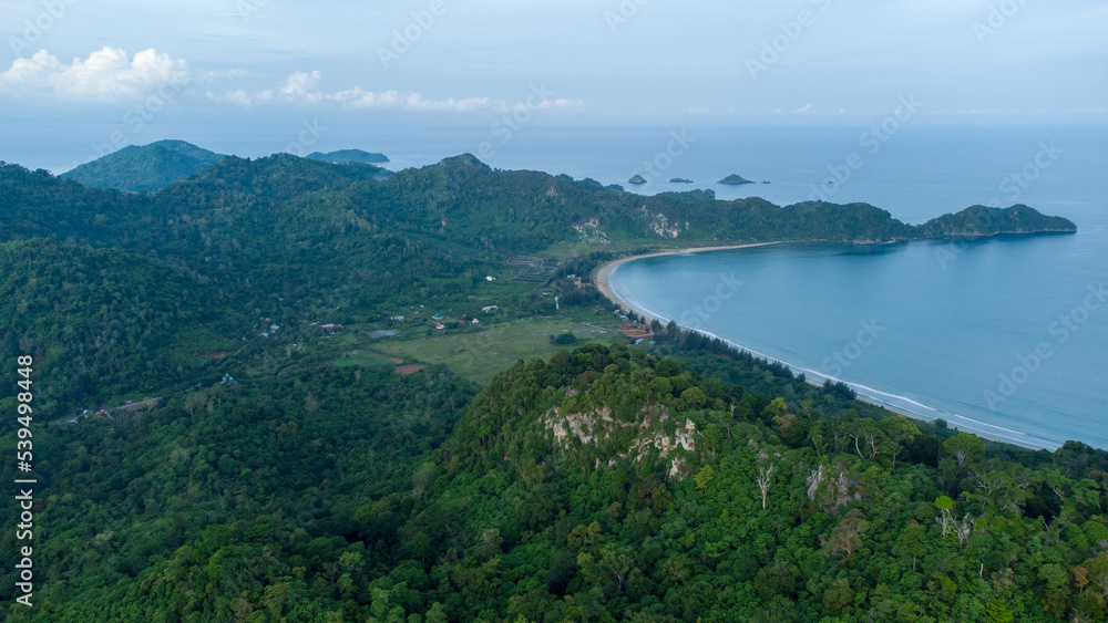 Aerial view of hills, tropical forest and Lhok paroy beach.