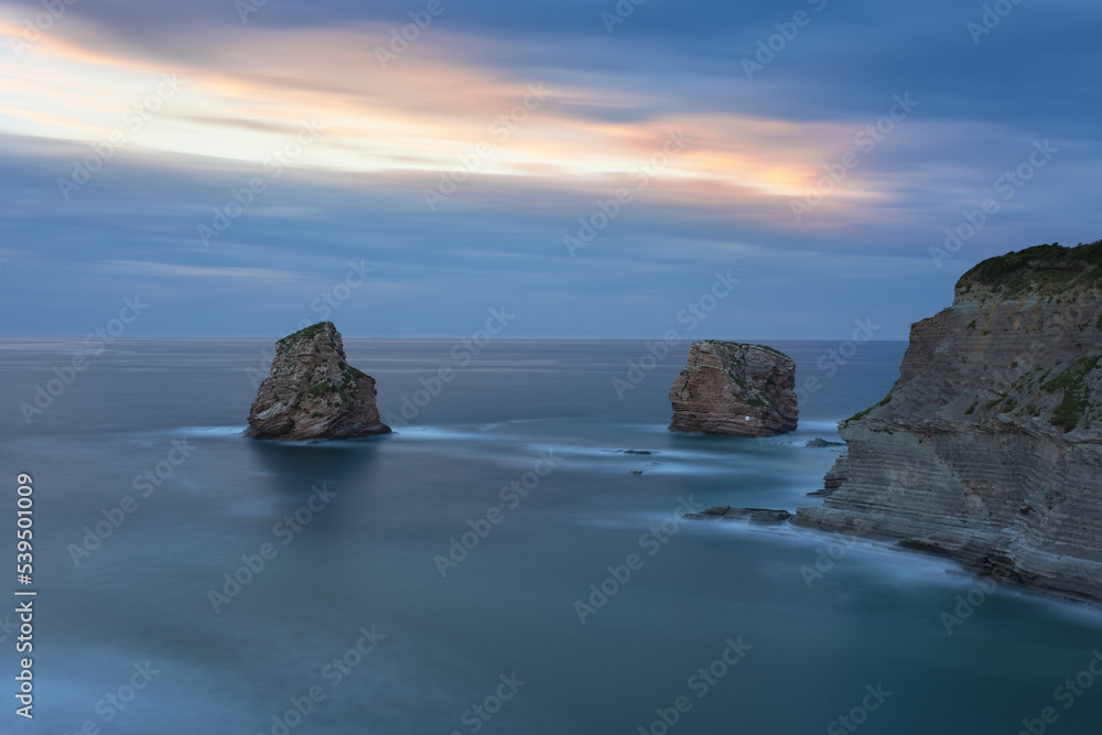 Two large rocks in the sea called the Gemelles in Hendaye, coast of France.