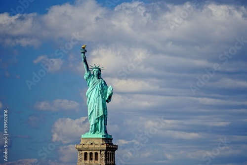 The Statue of Liberty on Liberty Island in New York Harbor. A gift from the people of France to the people of the United States. Designed by Frédéric Auguste Bartholdi and built by Gustave Eiffel. photo