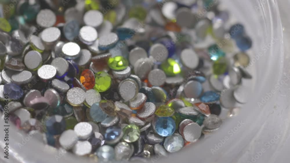silver sequins in a jar rotate in a circle silver sequins in a jar rotate in a circle