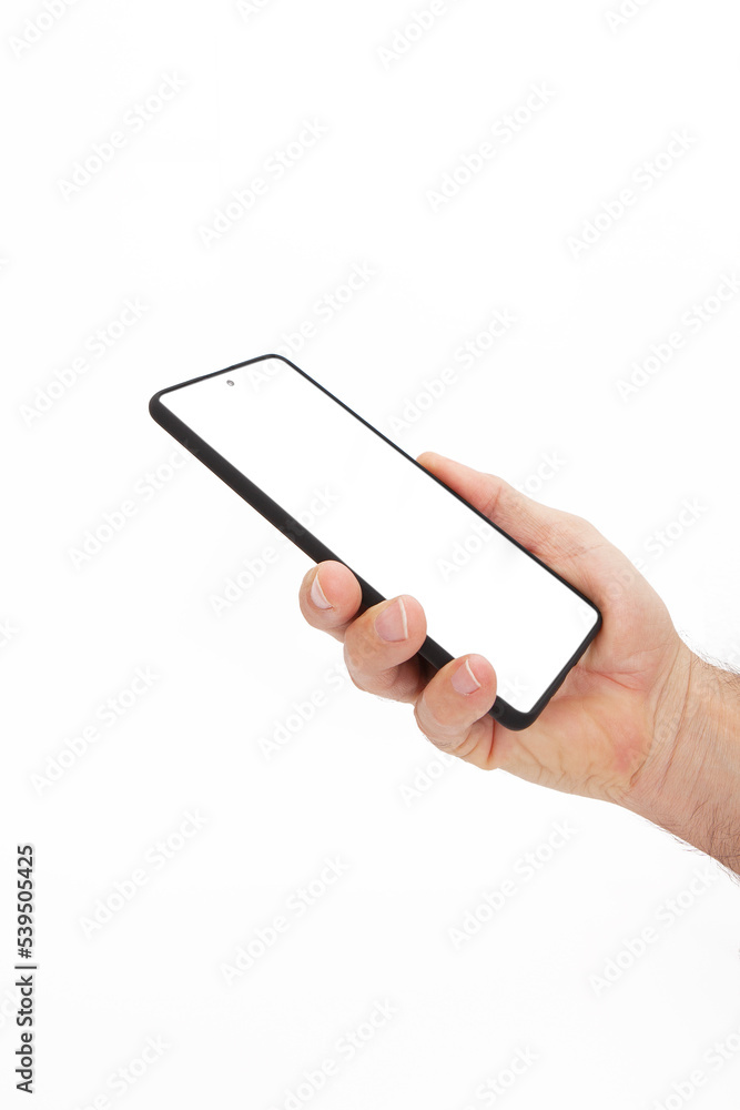 Hand holding mobile phone and blank screen for template advertising and branding technology background.
Realistic trendy smartphone mockup with thin frames and blank white screen isolated. Hand holding mobile phone and blank screen for template advertising and branding technology background.
Realistic trendy smartphone mockup with thin frames and blank white screen isolated.