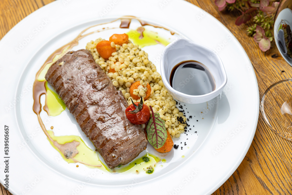 delicious steak from marbled meat in the restaurant
delicious steak from marbled meat in the restaurant