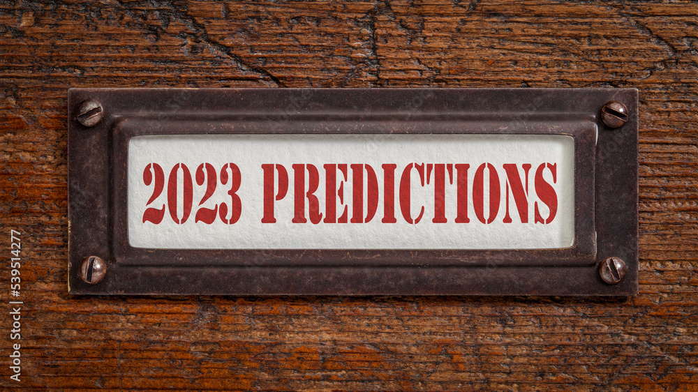 2023 predictions - a label on grunge wooden file cabinet. Expectation and speculation for the incoming year. 2023 predictions - a label on grunge wooden file cabinet. Expectation and speculation for the incoming year.