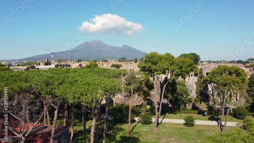 Pompei, Itay: Aerial drone footage of the famous Pompeii archaeological old city by the Vesuve volcano in Napoly, or Naples, in Italy on a sunny day.  photo