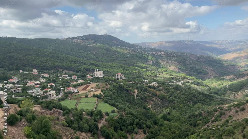 Timelapse of mountain top and nature view - Aerial view of Jezzine town in Lebanon, on an altitude of 1000m, surrounded by mountain peaks and pine forests - South Lebanon Timelapse of mountain top and nature view - Aerial view of Jezzine town in Lebanon, on an altitude of 1000m, surrounded by mountain peaks and pine forests - South Lebanon