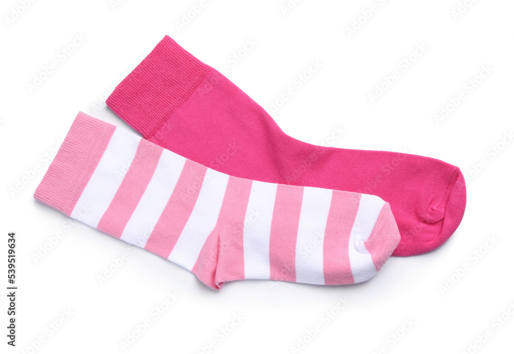 Different pink socks on white background, top view Different pink socks on white background, top view