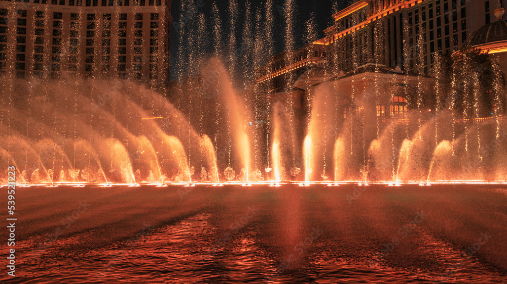 Las Vegas City Nightscape with red night water fountain display in