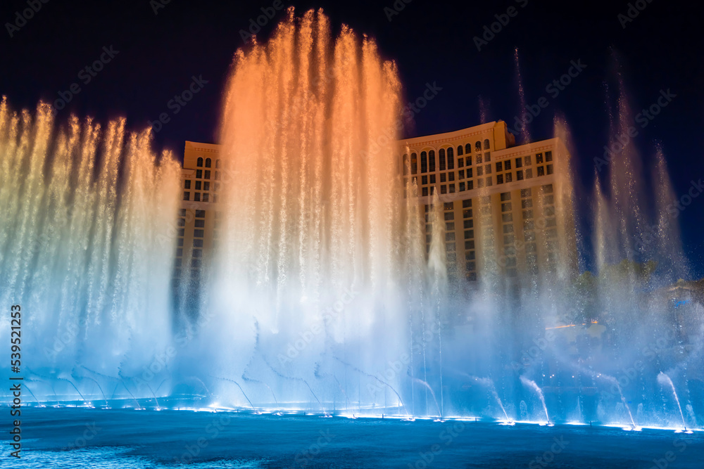 Las Vegas City Nightscape with red and blue night water fountain