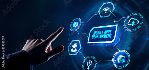 Internet, business, Technology and network concept. Inscription MOBILE APPS DEVELOPMENT on the virtual display. Cloud technology concept. Virtual button.