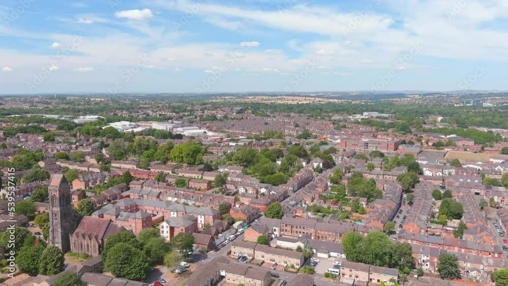 Derby, UK: Aerial view of city in England, suburb with residential houses and greenery - landscape panorama of United Kingdom from above Derby, UK: Aerial view of city in England, suburb with residential houses and greenery - landscape panorama of United Kingdom from above