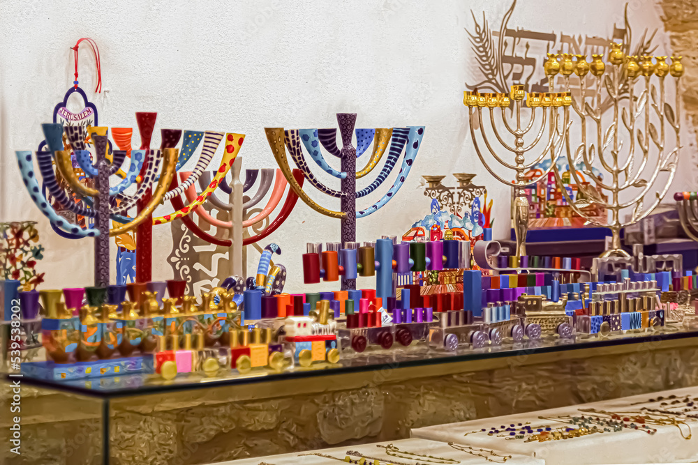 Hanukkah menorahs (traditional candelabra) in antique shop . Bazaar market inJ. Israel colorful  menorahat  Hanukkah' in street in israel  Jewish holiday Hanukkah 