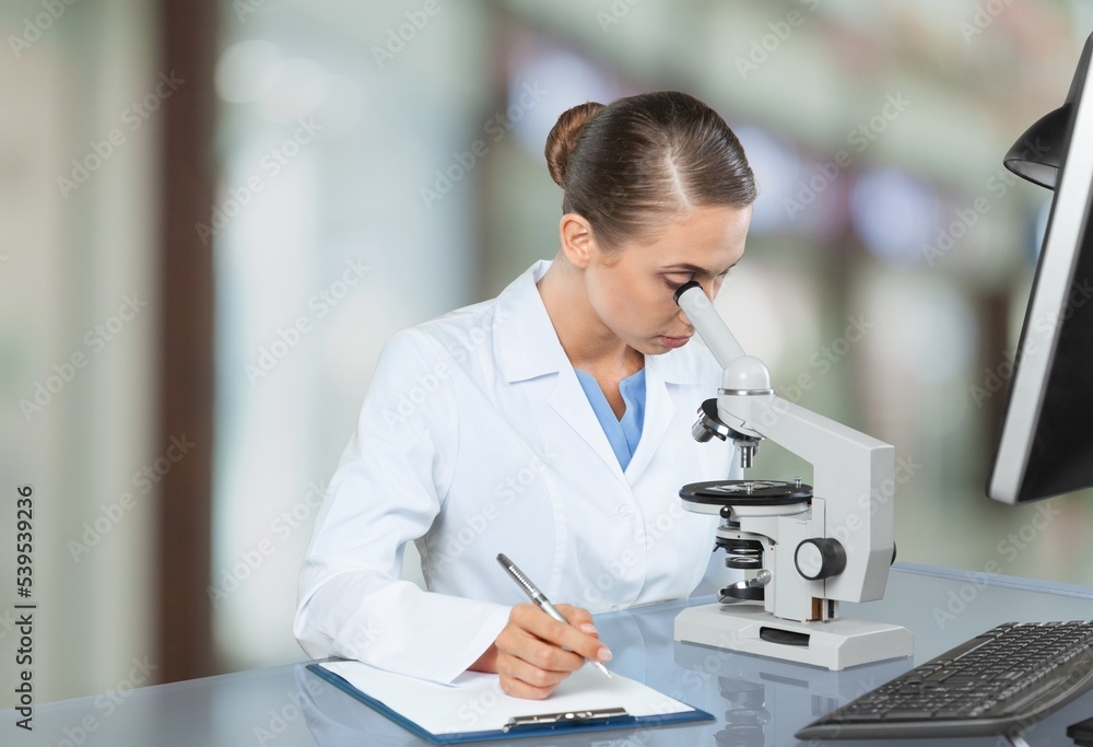 Serious medical scientist do research in laboratory Serious medical scientist do research in laboratory