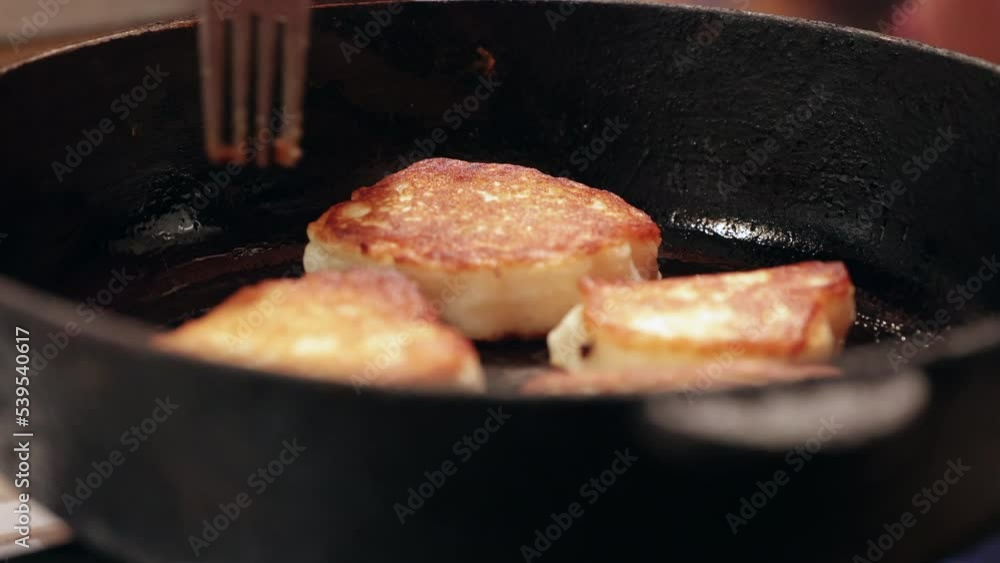 Making A Cheesecake Breakfast Is Cooked In A Frying Pan On A Gas Stove. 60 FPS, 4k, ProRes Making A Cheesecake Breakfast Is Cooked In A Frying Pan On A Gas Stove. 60 FPS, 4k, ProRes