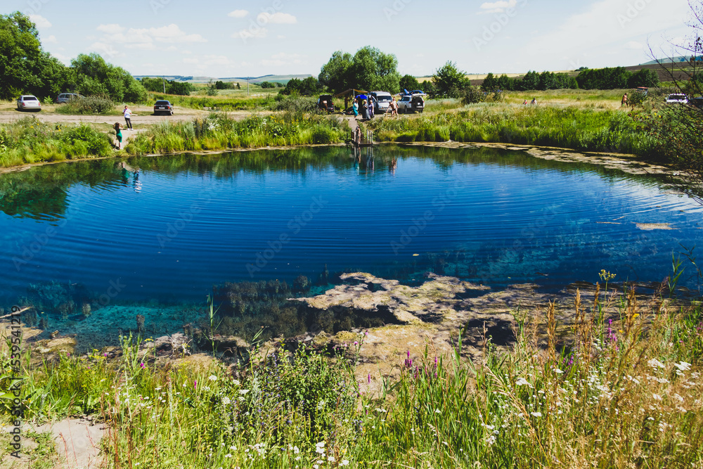 Lake with gray water. Blue lake in Samara region in Russia. Deep pond.